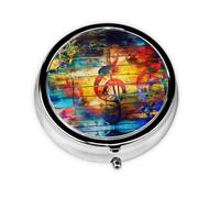 Nota musical de madera colorida. Este pequeño pastillero redondo es un organizador portátil de medicamentos de viaje con tres compartimentos para almacenar medicamentos diarios.