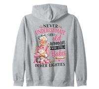 Nunca Subestimes a la anciana todavía hornea en Sus Ochenta Sudadera con Capucha