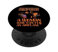Nunca subestimes a una mujer que puede volar un avión PopSockets PopGrip Adhesivo