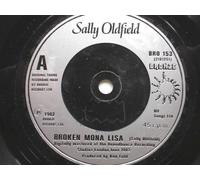Oldfield, Sally Broken Mona Lisa 7" Bronze BRO153 EX 1982 there is 2mm drill hole in label rim