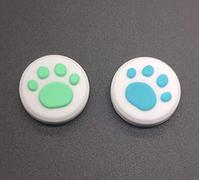 Palo de silicona para mando de mando analógico para Nintendo Switch NS & Switch Lite controlador Joy-Con garra de gato (azul + verde 2 unidades)