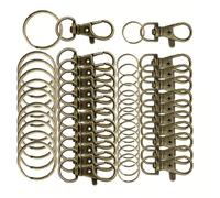 Paquete a granel de 60 llaveros giratorios de metal para proyectos de regalo creativos y entusiastas de la artesanía con cierre de mosquetón, accesorios coloridos para colgar bolsos, accesorios