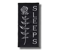 Parche bordado para planchar con texto en inglés "While She Sleeps"