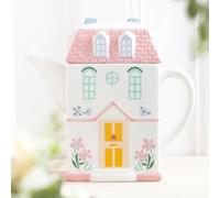 Tetera con forma de casa pastel
