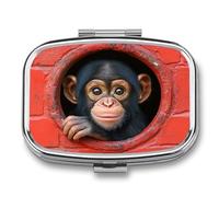 Pastillero de 2 compartimentos con diseño de chimpancé mirando a través de un agujero circular, organizador de pastillas de viaje para bolso de bolsillo