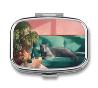 Pastillero portátil de 2 compartimentos con diseño de gato azul tumbado en un sofá verde, organizador de pastillas de viaje para bolso de bolsillo