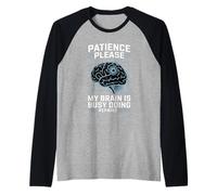 Patience Please My Brain Is Busy Doing Repairs - Camiseta Manga Raglan