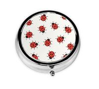 Patrón de mariquitas infinito moteado. Este pequeño pastillero redondo impreso es un organizador portátil de píldoras y vitaminas, perfecto para bolsillos, bolsos y viajes.