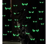 Pegatinas de pared que brillan en la oscuridad para Halloween, 54 pares de | Estas calcomanías que brillan en la oscuridad absorben la luz para emitir un brillo luminoso verde y naranja para una