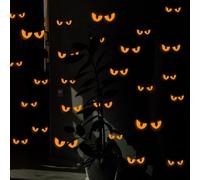 Pegatinas de pared que brillan en la oscuridad para Halloween, 54 pares de | Estas calcomanías que brillan en la oscuridad absorben la luz para emitir un brillo luminoso verde y naranja para una
