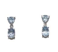 Pendientes con topacio azul sky y diamantes en oro blanco de 18k. Cierre presión. 1.50cm de largos