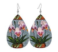 Pendientes de piel de orquídeas florecientes. Elegante forma de lágrima, perfectos para mujeres y una gran opción decorativa para fiestas y vacaciones.