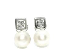Pendientes tu y yo para mujer de oro blanco de 18k con 0.22cts de diamantes y perla cultivada tipo de 10mm.