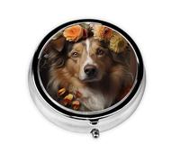 Perro niña con flores. Este pequeño pastillero redondo impreso es un organizador portátil de píldoras y vitaminas, perfecto para bolsillos, bolsos y viajes.