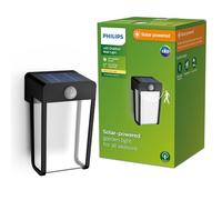 Philips Lighting: Aplique pared Exterior Shroud, alimentación solar, 2.3W, 2700K, negro, cristal transparente, sensor movimiento, resistente a intemperie IP44