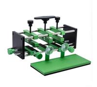 Plataforma de enderezamiento de marco para smartphone con sistema de abrazadera ajustable y zona de evitación de cámara dedicada para una protección segura de la lente