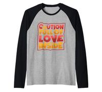Precaución: Lleno de Amor por Dentro Camiseta Manga Raglan