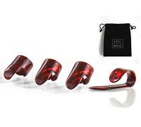 Púas de pulgar y dedo de guitarra ideales para recoger los dedos guitarra acústica, banjo o ukelele. El paquete del jugador viene con 1 púa para el pulgar y 3 púas de dedo. Incluye una bolsa gratis.