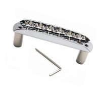 Puente Genérico Guitarra Acústica Para puente de guitarra estilo JM de 6 cuerdas. Espaciado entre cuerdas: 10.8 mm. Cromo plateado.