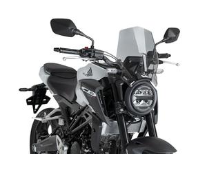 Puig 22296H New Generation Sport en Ahumado, carenabris diseñado para mejorar la protección aerodinámica, renovar el estilo de la moto y ofrecer una instalación precisa y estable