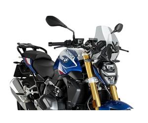 Puig 22299H New Generation Sport en Ahumado, carenabris diseñado para mejorar la protección aerodinámica, renovar la estética de la motocicleta y ofrecer un montaje sencillo y un ajuste seguro