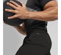 PUMA Pantalones tejidos con gran logo Train All Day para hombre, Accesoiros, Negro, XS XS