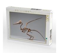 Puzzle · Esqueleto de Pteranodon con envergadura y Perfil de Peine | Un elegante esqueleto de Pteranodon con un peine típico y amplio… · 1000 piezas · Tamaño de colocación 64 × 48 cm · CALVENDO