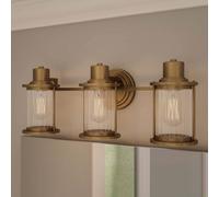 QUOIZEL Aplique de pared Riggs IP44, latón envejecido, 3 luces