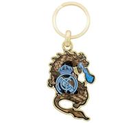 Real Madrid Llavero metálico premium con diseño de dragón y emblema, ideal para aficionados y coleccionistas.