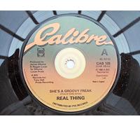 Real Thing She's A Groovy Freak 7" Calibre CAB105 EX 1980 there is punch hole in label rim & a handwritten number on label