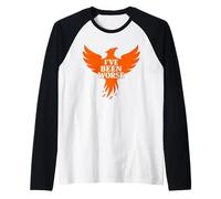 Renacimiento de Phoenix surgiendo de la resiliencia de Las Cenizas Camiseta Manga Raglan