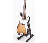 Replicamusical bajo en miniatura de Sting, del grupo musical The Police con golpes como original, mas stand exclusivo, mas correa.