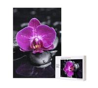 Rompecabezas de madera de 300 piezas con orquídeas sobre piedra negra para diversión familiar y para adultos.
