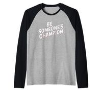 Sé el campeón de Alguien. Motivacional Camiseta Manga Raglan