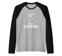 Sé el carpincho, tranquilo y divertido montando un caimán, vibraciones relajadas Camiseta Manga Raglan