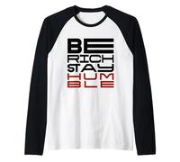 Sé rico, mantente humilde: una declaración para mentes impulsadas por un propósito Camiseta Manga Raglan
