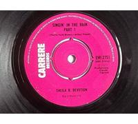 Sheila & B. Devotion - Sheila B. Devotion - Singin' In The Rain Part 1 / Singin' In The Rain Part 2 (7" Vinyl)