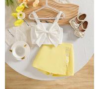 Shein 1 Conjunto Lindo Outfit de Verano para Niña Bebé, Incluyendo 1 Blusa Blanca sin Mangas con Decoración de Moño Grande y 1 Falda Envolvente Amarilla Fas