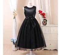 Shein 1 Pieza del vestido de princesa negro y blanco elegante y de moda para niñas. La falda usa mucha gasa de malla negra que brilla bajo la luz. La parte