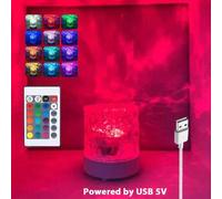 Shein 1 pieza Luz de onda de agua giratoria dinámica de 16 colores, lámpara de mesita de noche para dormitorio, decoración de pared para sala de estar, ilum