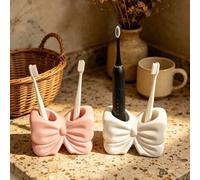 Shein 1 pieza Soporte para cepillo de dientes y pasta de dientes con 2 ranuras, blanco y rosa con lazo lindo, contenedor de almacenamiento para brochas de m