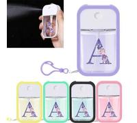 Shein 1 pieza Spray desinfectante de manos hidratante, botella de spray portátil de viaje de 50ML con letra morada, soporte de silicona para desinfectante d