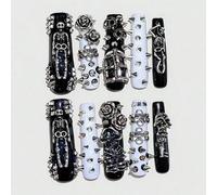 Shein 10 remaches oscuros punk, almohadillas de uñas falsas con calavera y una pieza de cinta adhesiva por ambos lados