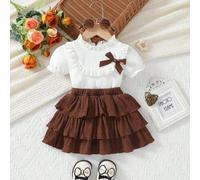 Shein 2 piezas Conjunto de verano lindo para bebé niña, blusa con cuello de volante blanco con moño marrón y shorts a juego, apto desde recién nacido hasta
