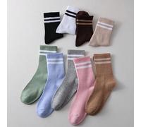 Shein 5 pares de calcetines de media caña a rayas de moda para mujer, con colores que incluyen negro, blanco, gris, rosa y marrón. Estos calcetines a rayas