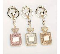 Shein Accesorio creativo y de moda llavero colgante de coche con cristales, colgante de botella de perfume con cristales para bolso de mujer, regalo para da