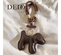 Shein Accesorio de llavero de béisbol personalizado con colgante de perro salchicha de chocolate de INS, con cordón trenzado "Amo a mi novio"