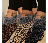 Shein Calcetines de piso de invierno para mujer con estampado de leopardo negro. Calcetines gruesos y cálidos de lana esponjosa para otoño e invierno. Calce