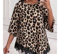 Shein Camisa de moda talla grande con estampado de leopardo, patchwork de encaje y dobladillo asimétrico