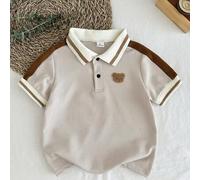 Shein Camisa polo para niño con cuello, botones en la mitad del pecho, gráfico 3D de oso, uso casual diario, manga corta